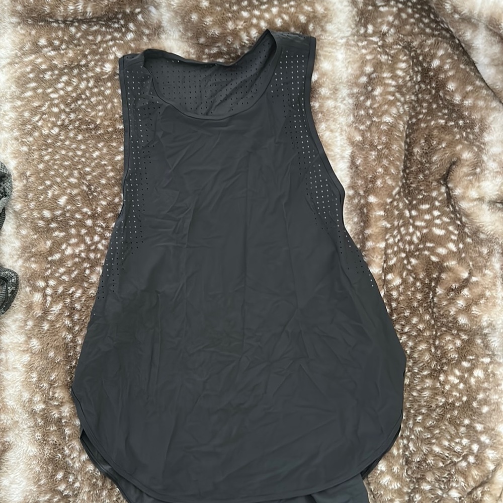 Dark gray lululemon athletic too w/large arm holes and eyelets great condition